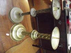 Two early church brass candle sticks