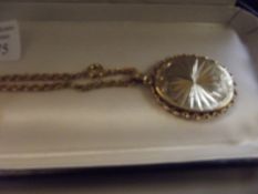 9 ct gold rope chain and pendant, 9 grams