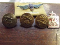 Collection of military buttons and badges