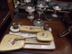 Dressing table set together with a plated candelab