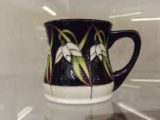 Moorcroft mug, snowbound