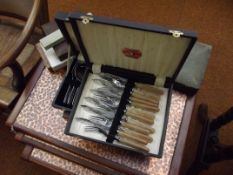 Large group of boxed flatware