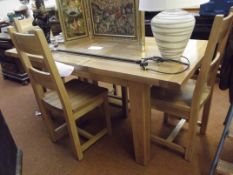 Good quality solid oak dining table and four chair