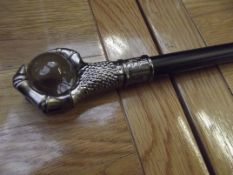 Walking stick with ball and claw finial