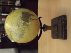Globe on wooden base