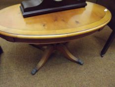 Regency style yew wood coffee table