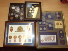 Four framed coin sets