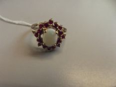 9 ct gold opal and garnet dress ring