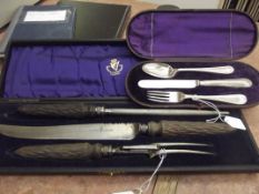 Victorian cased carving set together with a knife,
