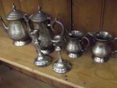 Pair of sterling silver candle sticks together wit
