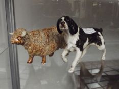 Beswick dog and a ceramic bull