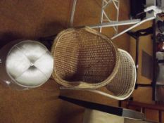 Two wicker child's chairs together with a pouffe