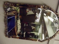 Art deco bevel edged wall mirror with peach tinted
