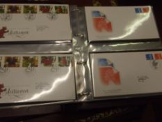 Album containing First Day Covers