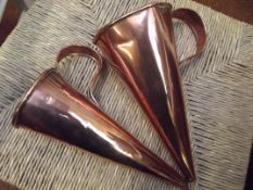 Two Victorian copper ale warmers