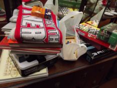 Assorted board games, chess boards, football books