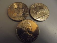 Three £5 coins