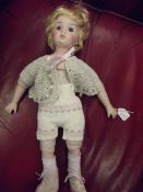 Bisque head, arms and legs doll with soft body