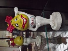 Cast iron Esso woman