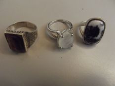 Three silver dress rings