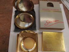 Stratton compact together with a Estee Lauder comp