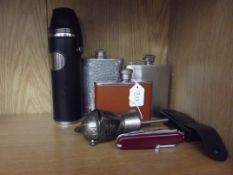 Whiskey flasks, wine pourer and a pen knife
