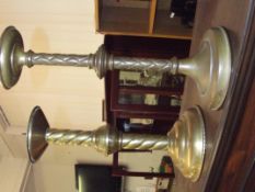 Two brass church candle sticks