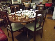 Extending dining table and four chairs