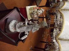 Ceramic table lamp in the form of a lady
