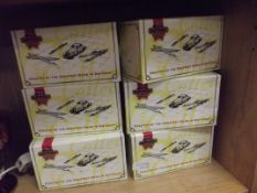 Six Matchbox model vehicles, boxed