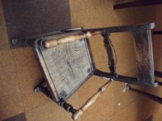 Victorian rush seated childs' rocking chair