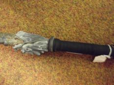 Heavy Oriental cast iron rod with handle