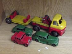 Tin plate truck together with Dinky and others