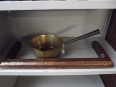 Vintage brass pan together with a copper fire surr