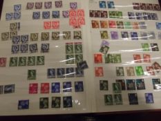 Stamp album containing British stamps