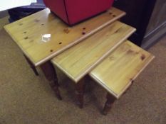 Nest of three pine tables