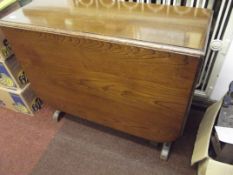 Oak drop leaf dining table