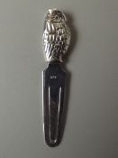 Silver stamped book marker, owl