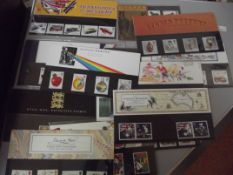 Presentation packs of mint stamps