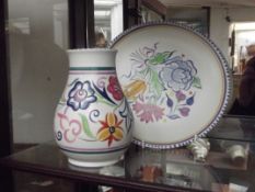 Poole vase together with a cabinet plate