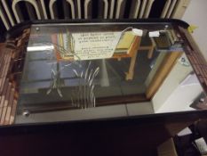 Art deco style wall mirror with peach tinted tiles