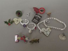 Black box of jewellery and badges