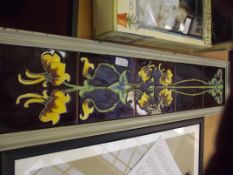 Five art nouveau style tiles set in a frame