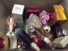 Assorted lady's cosmetics and perfumes