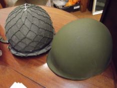 Two military helmets