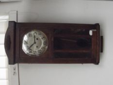 Oak cased wall clock