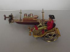 Two tin toys