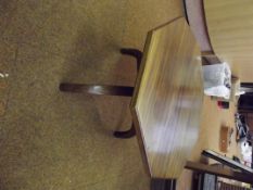 Octagonal wine table on earlier down-swept legs