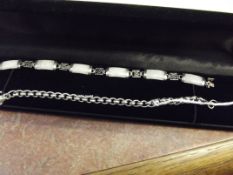 Silver and Jade bracelet together with a further s