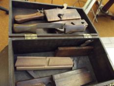 Wooden case containing vintage planes